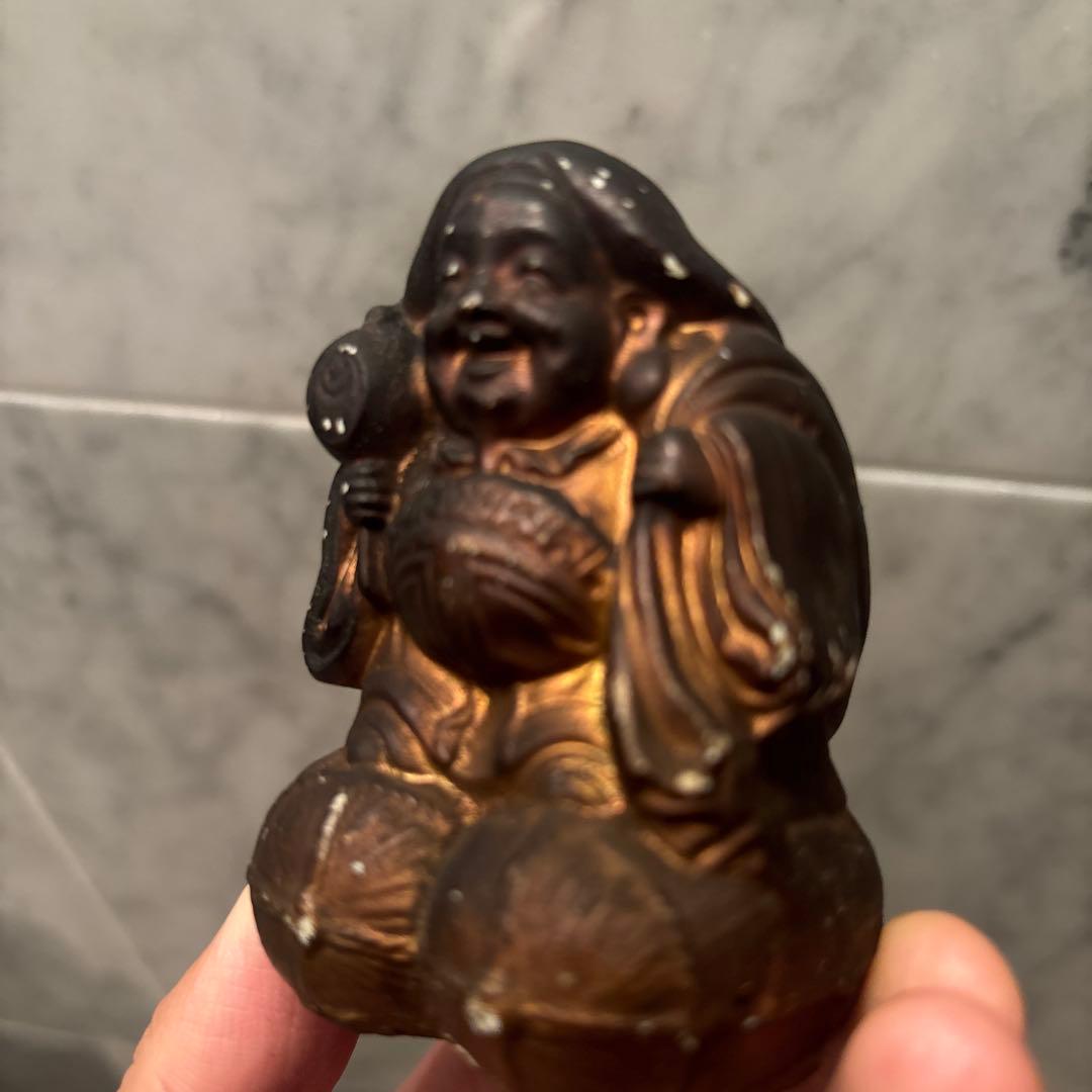 アンティーク明治時代平和的なお顔で 笑顔が素敵な大黒様の陶器オブジェ