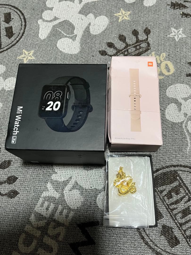 18 K ドラゴンペンダント (1 gram) とxiomi watch