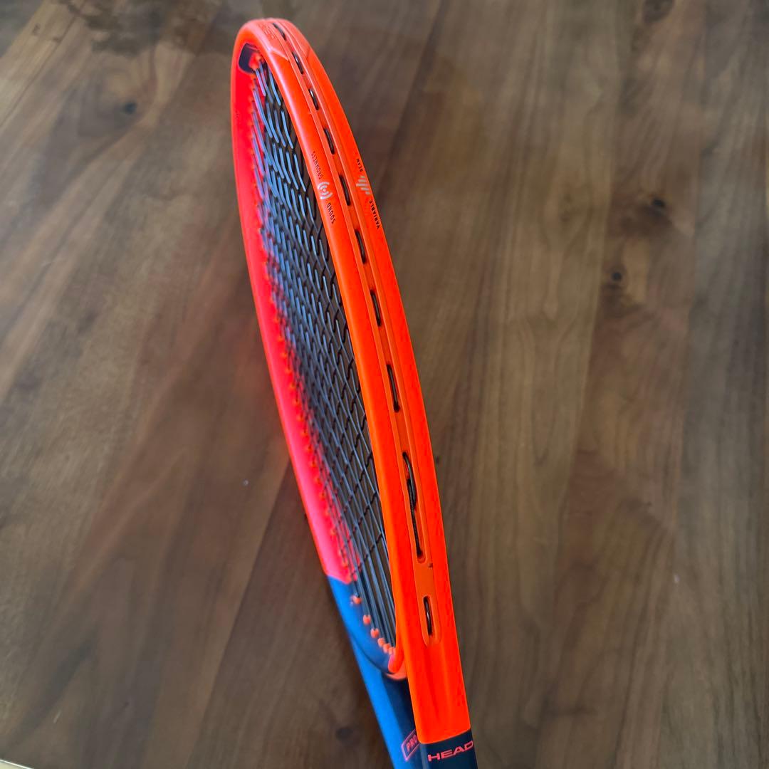 HEAD オレンジ＆ブラック Radical Pro AUXETIC