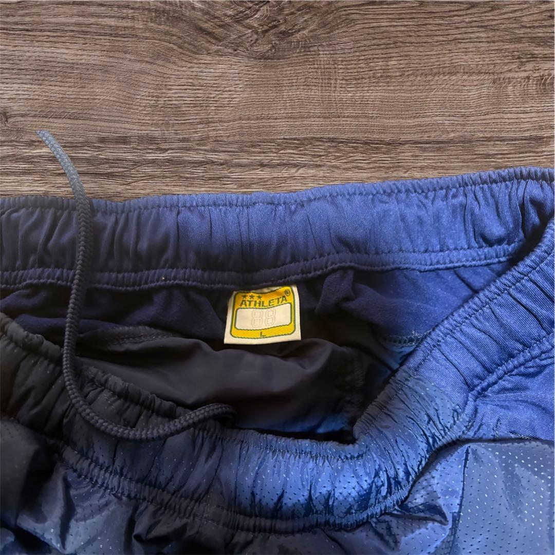 ATHLETA ピステ・ウィンドブレーカーセット ネイビー　Lサイズ