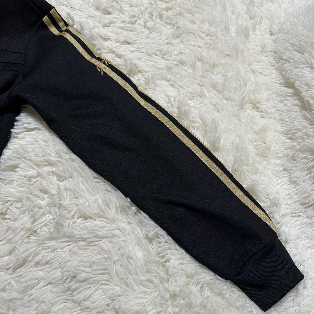 アディダス トレフォイル ロゴ刺繍 トラックジャケット ブラック 黒 金色