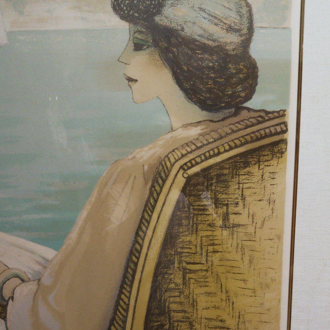 カシニョール 籐椅子の婦人