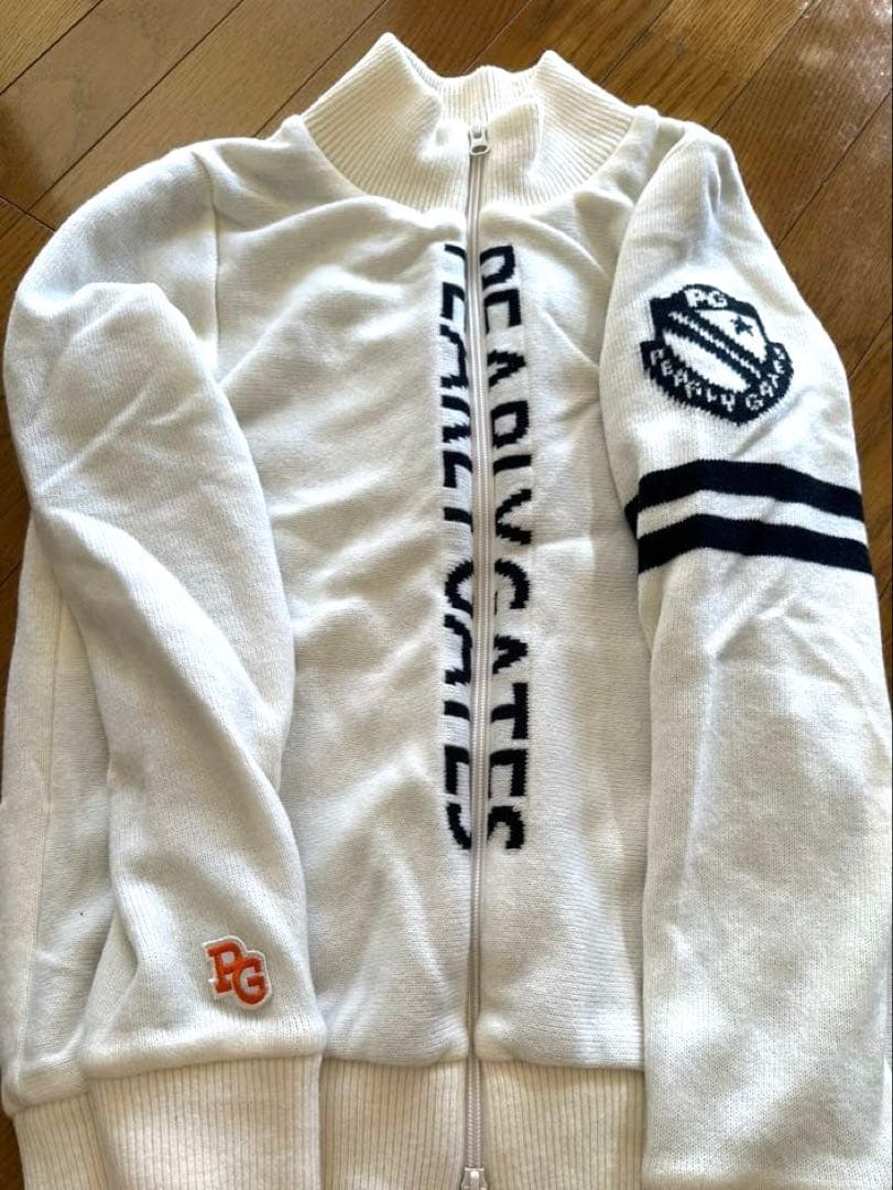パーリーゲイツ ロゴ付きホワイトジップアップセーター