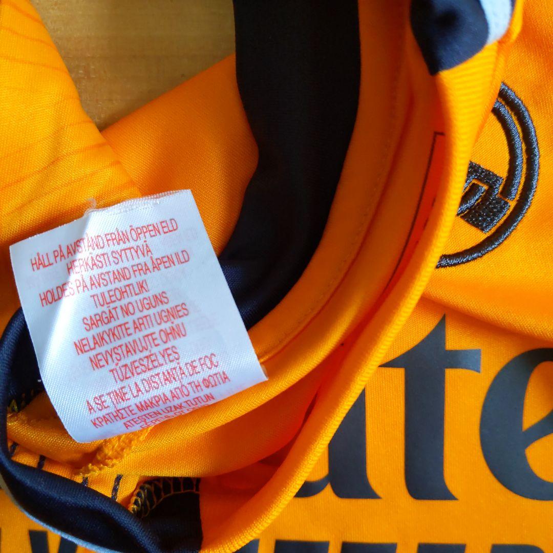 Real Madrid シャツ オレンジ 7-8Y