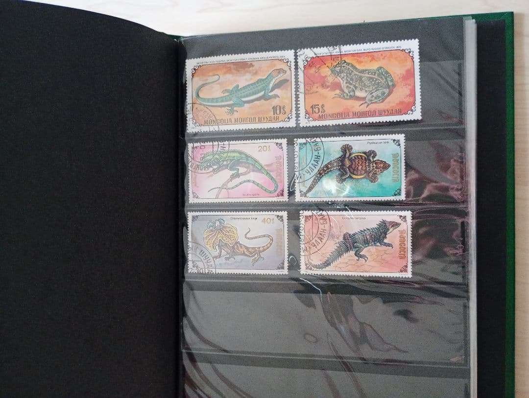 希少31まで限定出品！手彫竜銭ヘビ爬虫類トカゲ　テージー切手アルバムまとめ売り