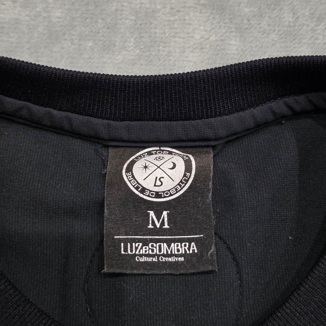 ルースイソンブラ　トップチーム　LTT　プラシャツ　M　黒　ドミンゴ