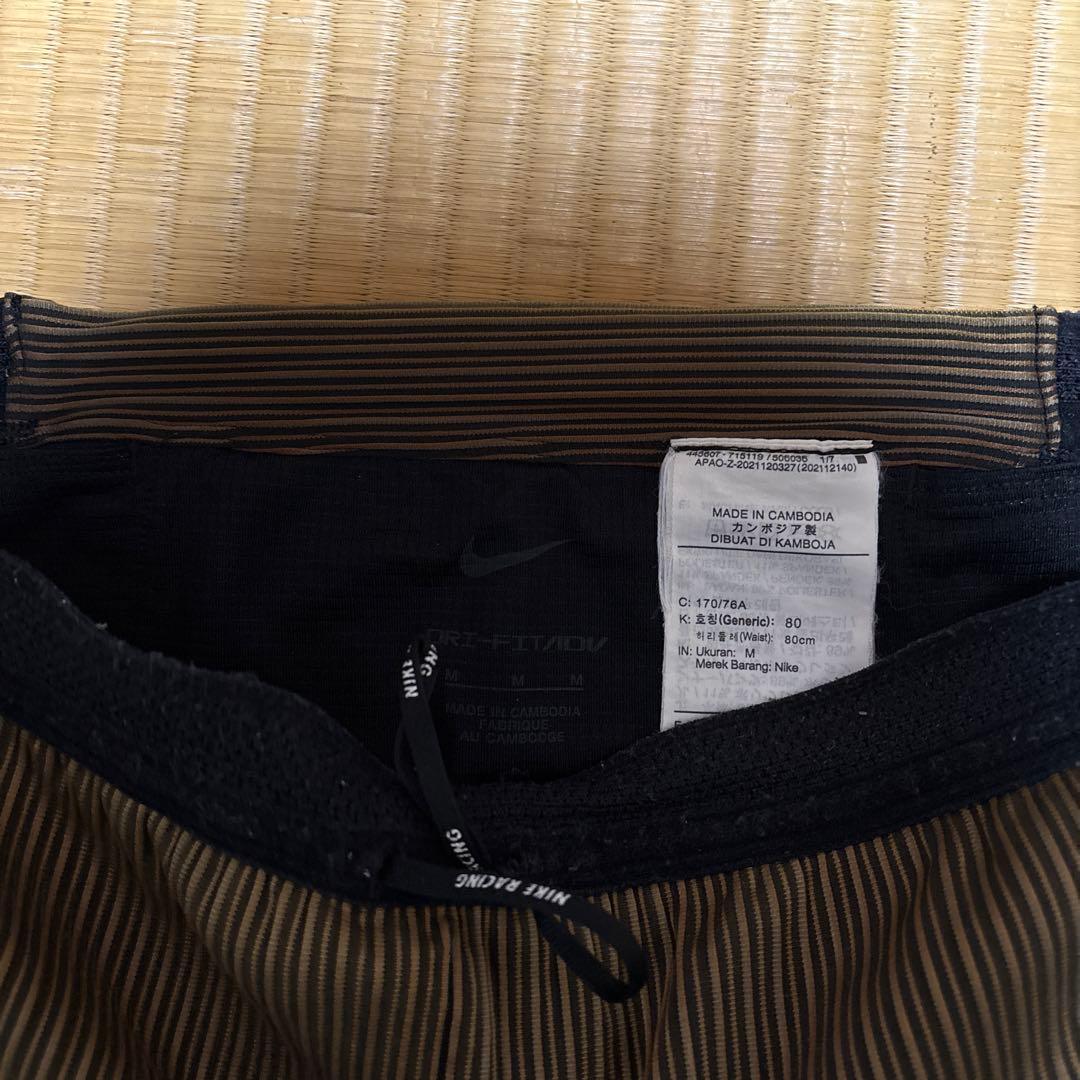 Nike 蛍光イエロー タンクトップ