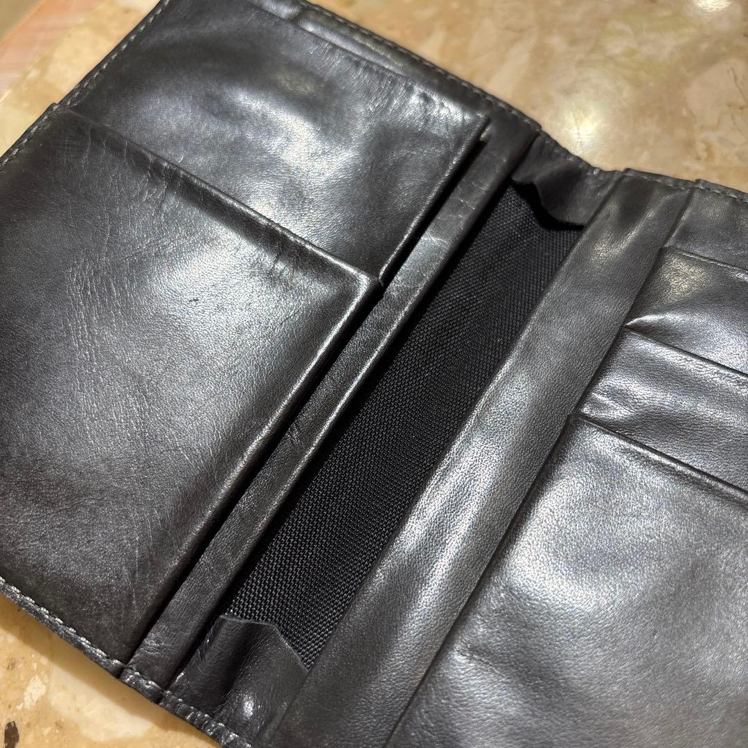 新品タグ付きm0851 黒 レザー パスポートケース