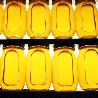 リピータ多数　プロが絞った濃厚な味わいの国産百花蜜　梅酒瓶入り　おまけ付