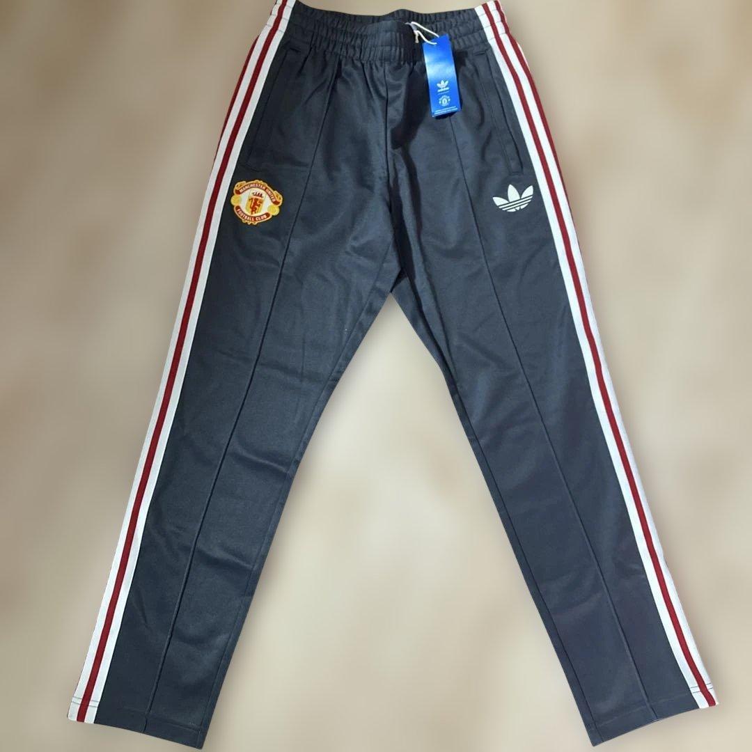 新品未使用タグ付き‼︎マンチェスター×adidasトラックパンツ　ジャージLサイズ