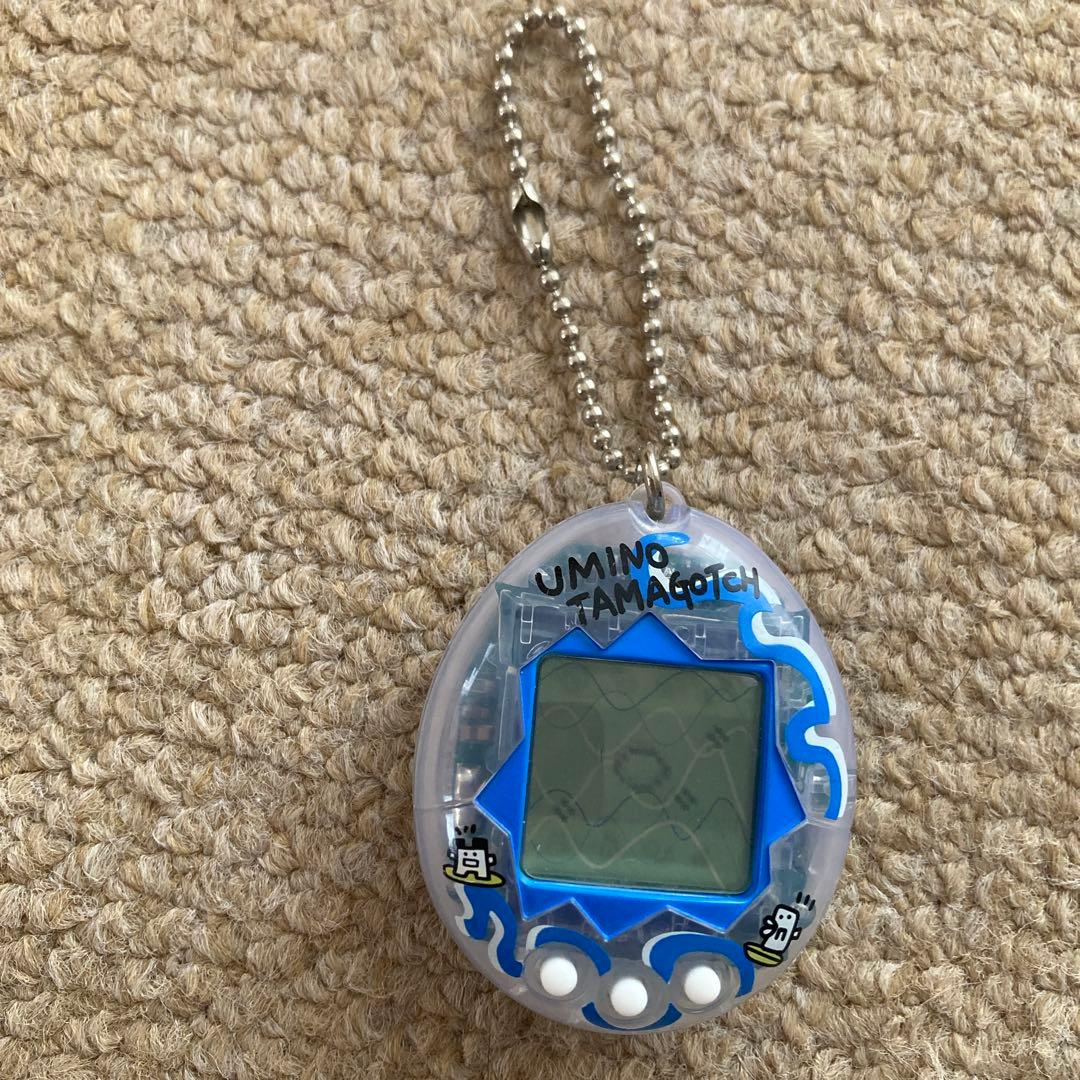 青 スケルトン透明柄1997年製　海で発見‼︎たまごっち