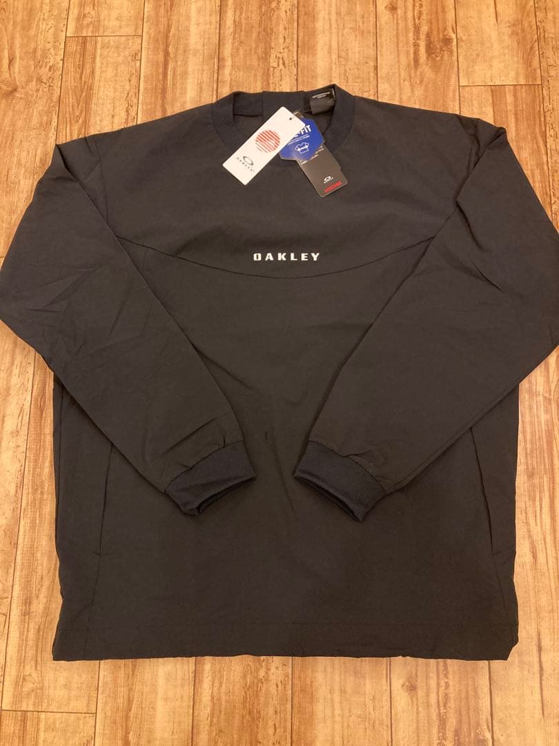 OAKLEY オークリー　サイズＬ 新品未使用品　プルオーバー　メンズウェア