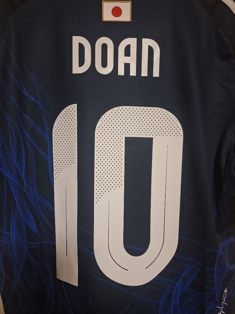 新品未使用。 サッカー日本代表　堂安律選手　レプリカユニフォーム Oサイズ