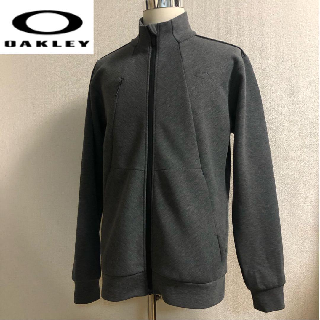 オークリー テック系 ジップアップ ジャケット◆グレー XLサイズ