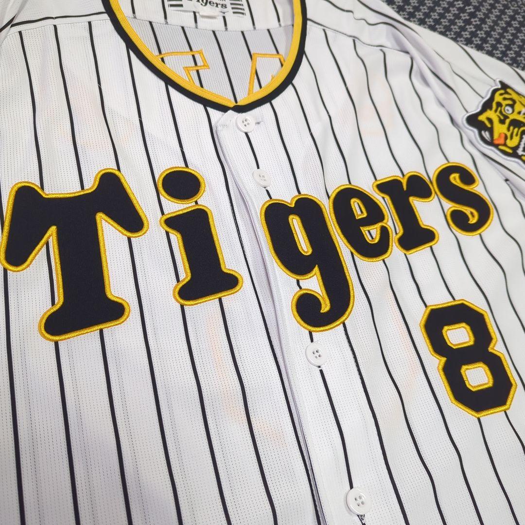 阪神タイガース　チャンピオン　エンブレム付き　ユニフォーム　佐藤輝明【Ｌサイズ】