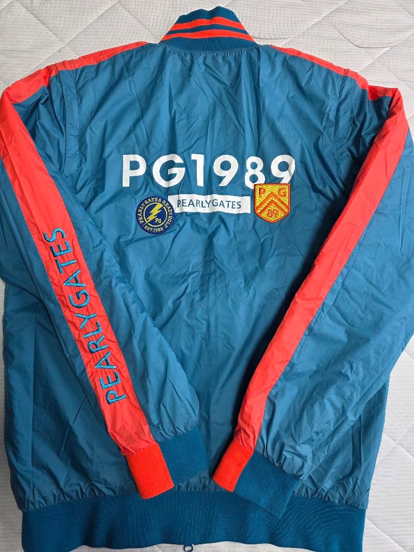 美品パーリーゲイツ蓄熱・防風・撥水中綿リバーシブルジャケット４