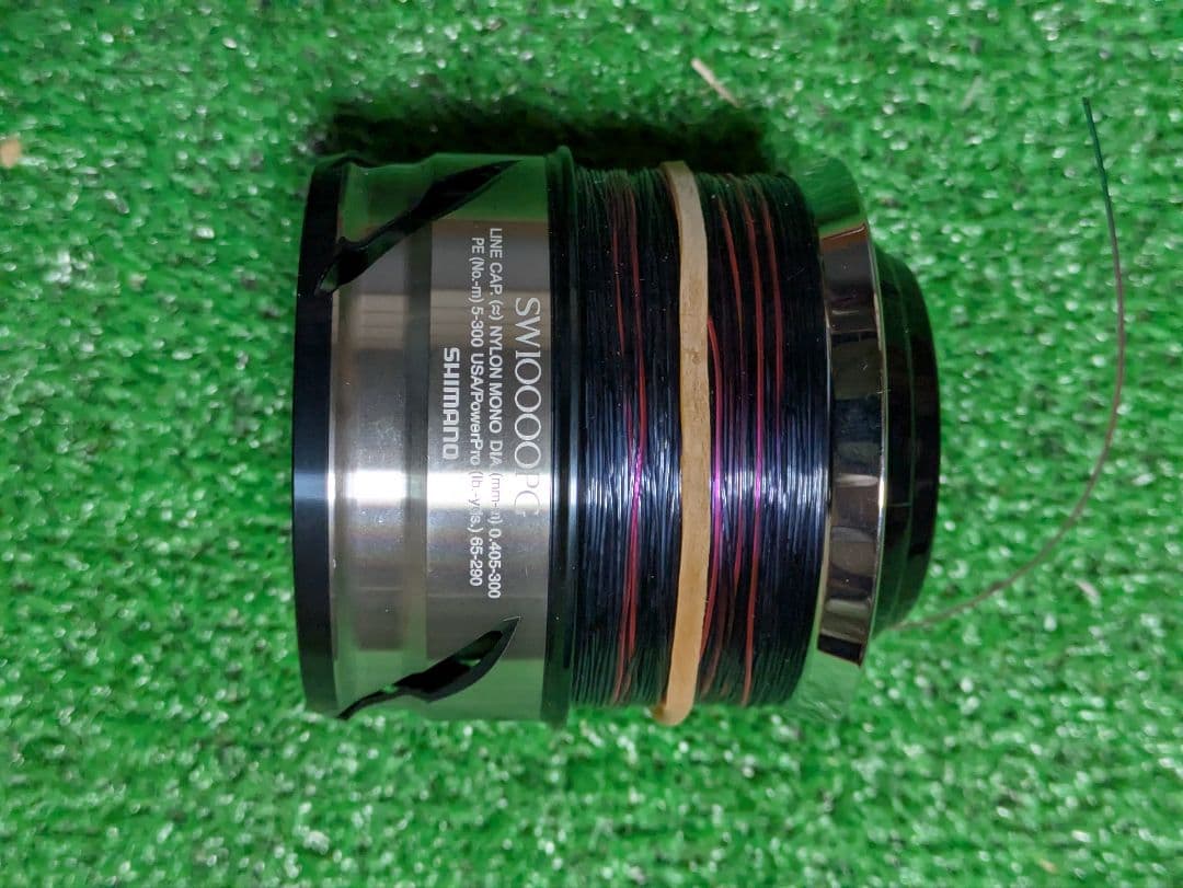 新品未使用。21ツインパワーSW10000PG純正スプール　即日発送可