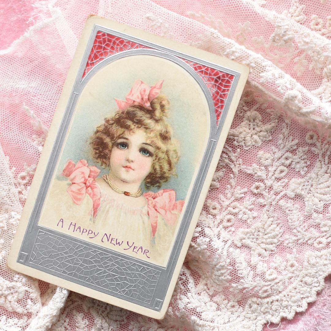 *アンティークポストカード　ピンクリボンの愛くるしい少女　　ブランデージ