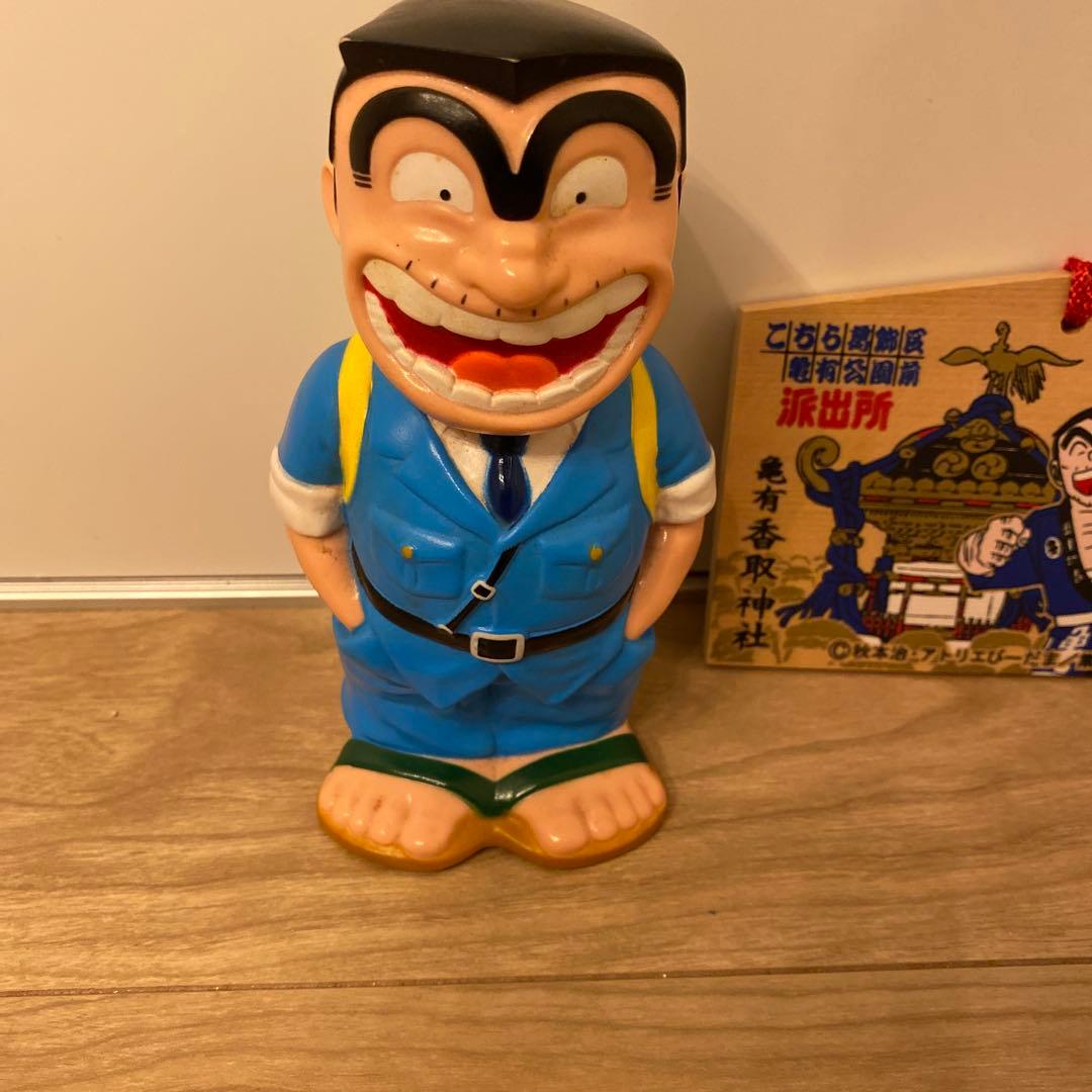 m*e様 こちら葛飾区亀有公園前派出所　こち亀　ワハハ　両さん貯金箱　ストラップ