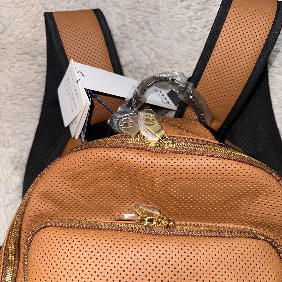 muta★コンティニュアパンチングエシカルレザーバックパック