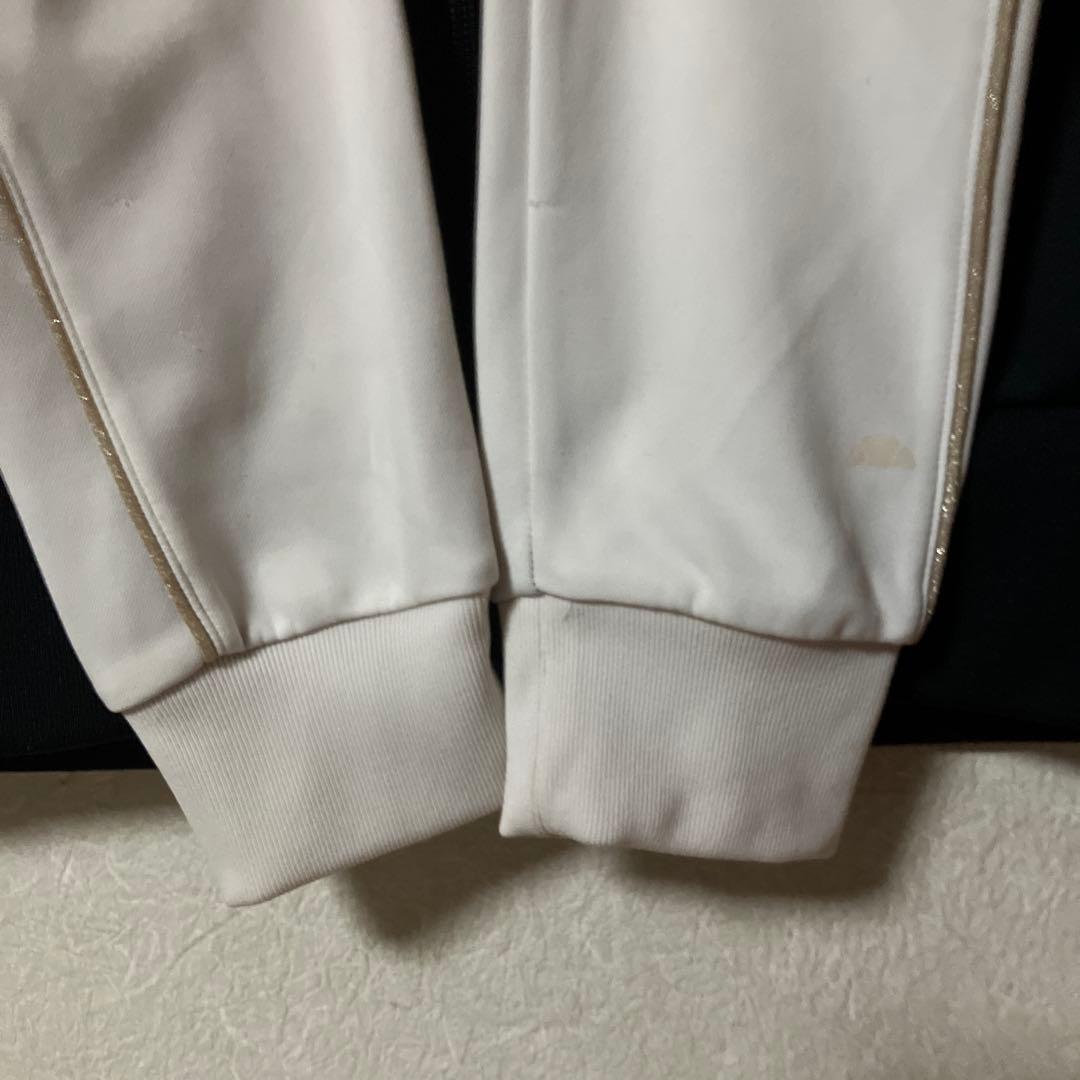 ELLESSE ジャージセットアップ ブラック パンツバックロゴ刺繍レディースＭ