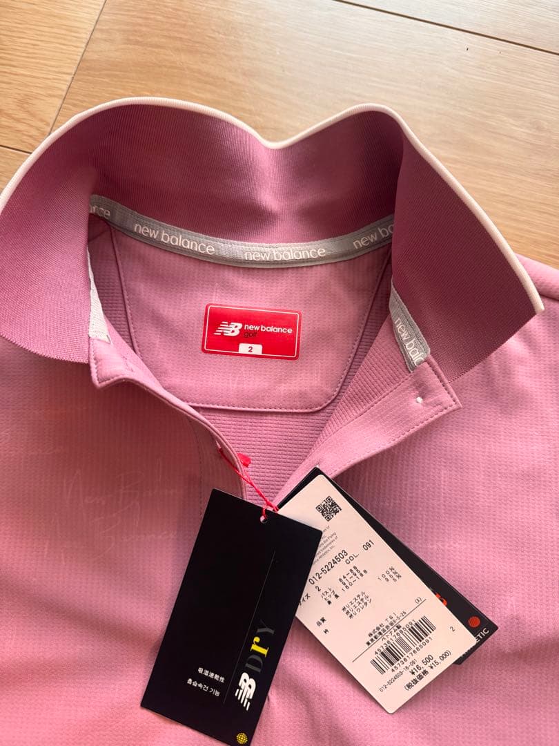 【新品未使用】New Balance ワンピース ピンク レディース Mサイズ