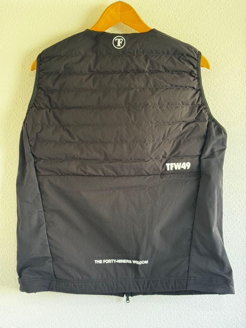 メンズウェア TFW49 SHIELD WARMER COLLARLESS VEST M