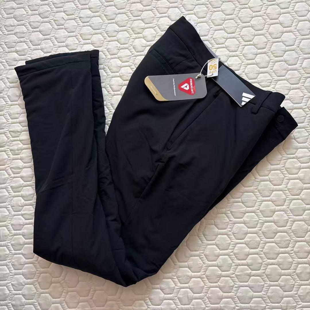 92新品27500円アディダスゴルフ/メンズ/秋冬/中綿ストレッチパンツ/黒
