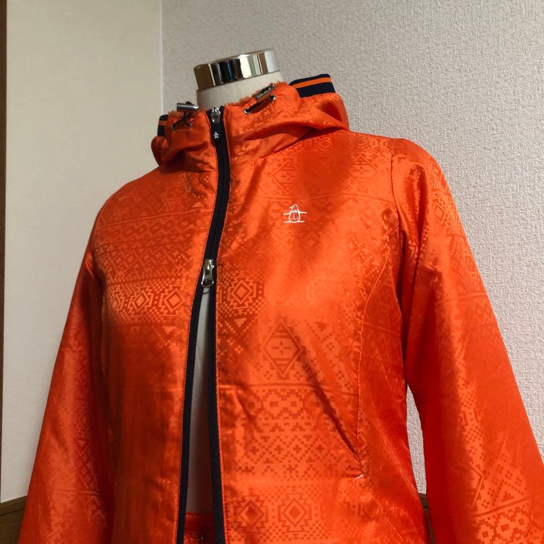 セットアップ マンシングウェア 中綿 パーカー スカート オレンジ 総柄 M