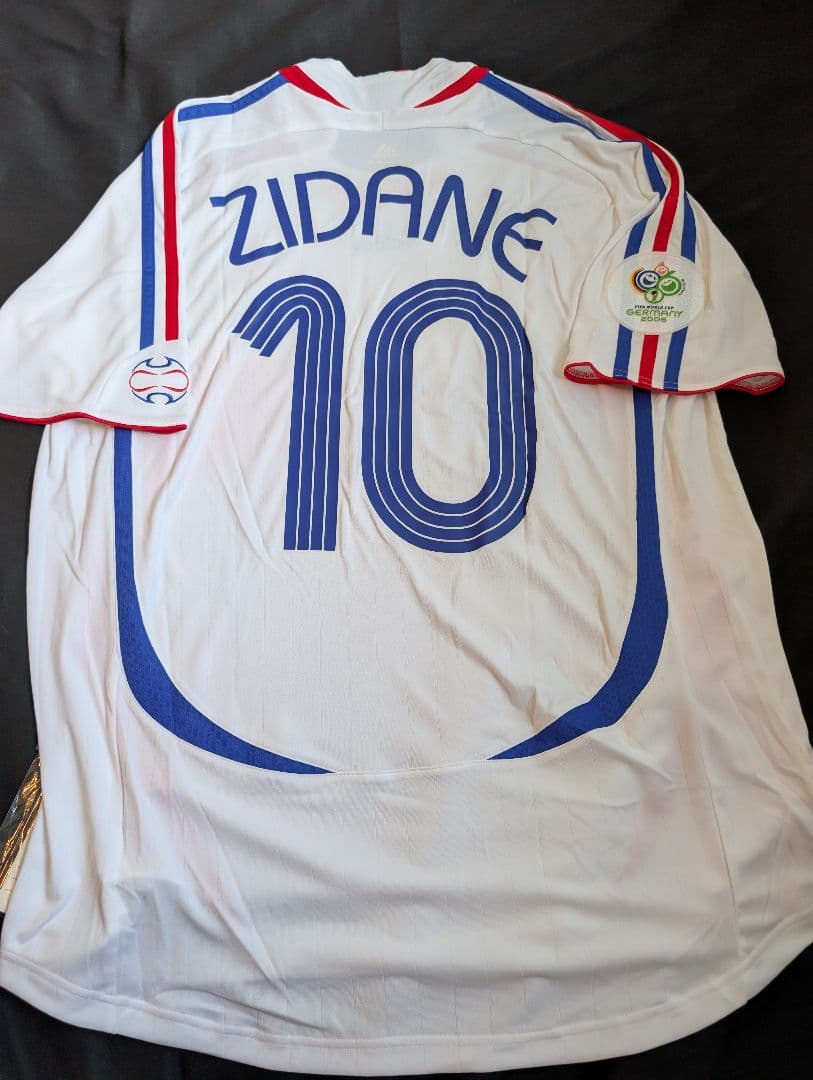 【新品タグ付き】フランス代表/ジネディーヌ・ジダン/A/2006W杯頭突きモデル