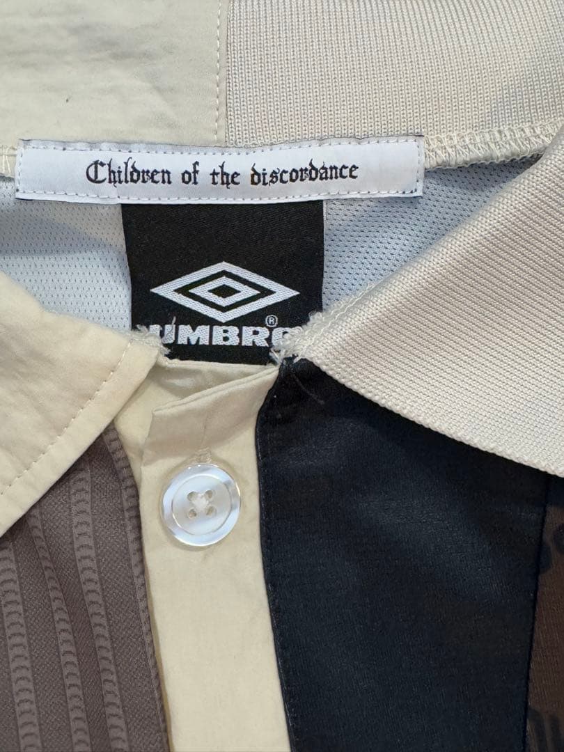 ウェア Children of the discordance x UMBRO