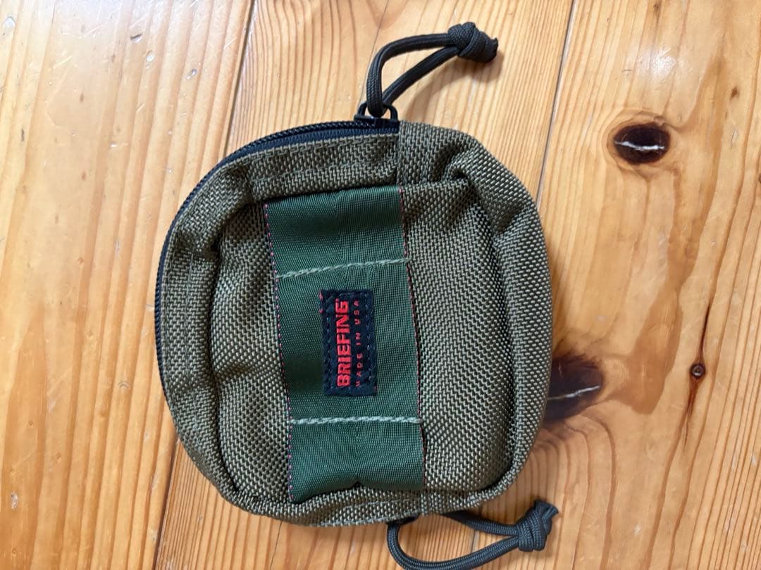 ブリーフィング 20周年記念 ハンディポーチ CRAZYマルチカラー