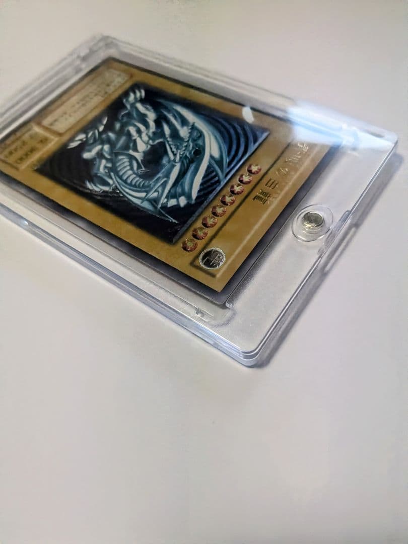 青眼の白龍 UL[SM-51](仮面の呪縛)レリーフ　アルティメットレア　シク