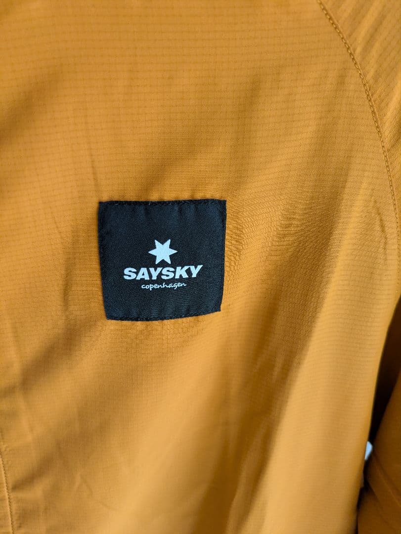 saysky セイスカイ　オレンジ ウインドブレーカー　サイズxs