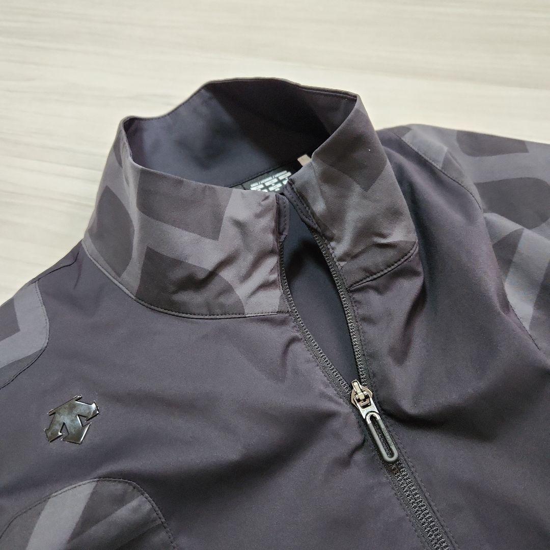 DESCENTE GOLFタイポグラフィモチーフウィンドジャケットストレッチM黒