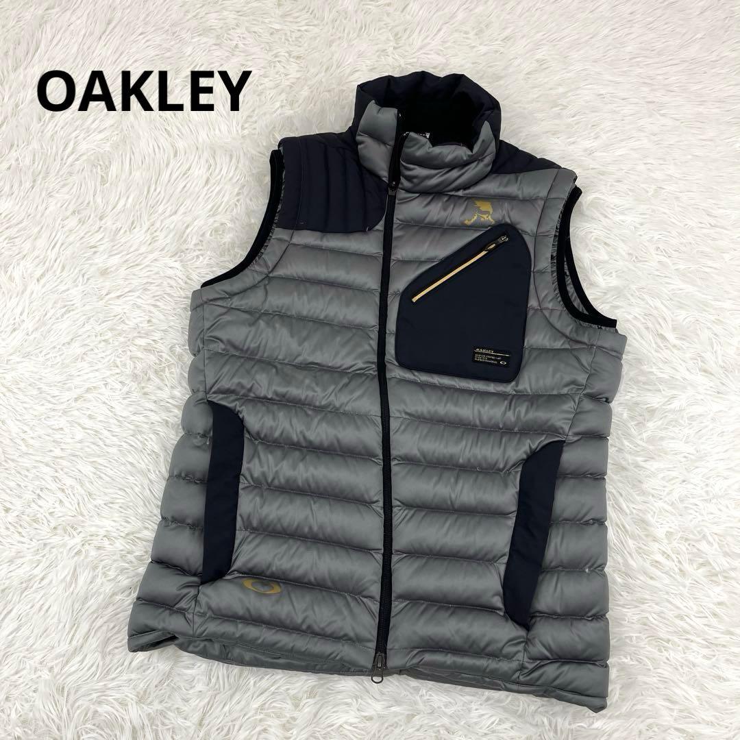 【美品】オークリー・ゴルフウェア・ダウンベスト・アシンメトリー・ロゴプリント・M