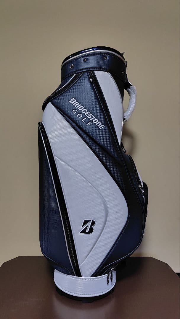 キル新品未使用ブリヂストン キャディバッグ ネイビー/ホワイト　9型