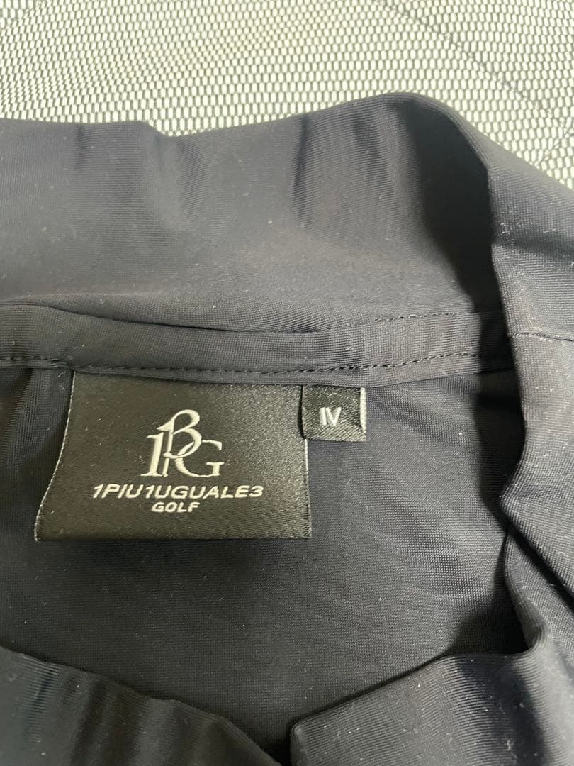 1PIU1UGUALE3 ゴルフシャツ ブラック IV モックネック