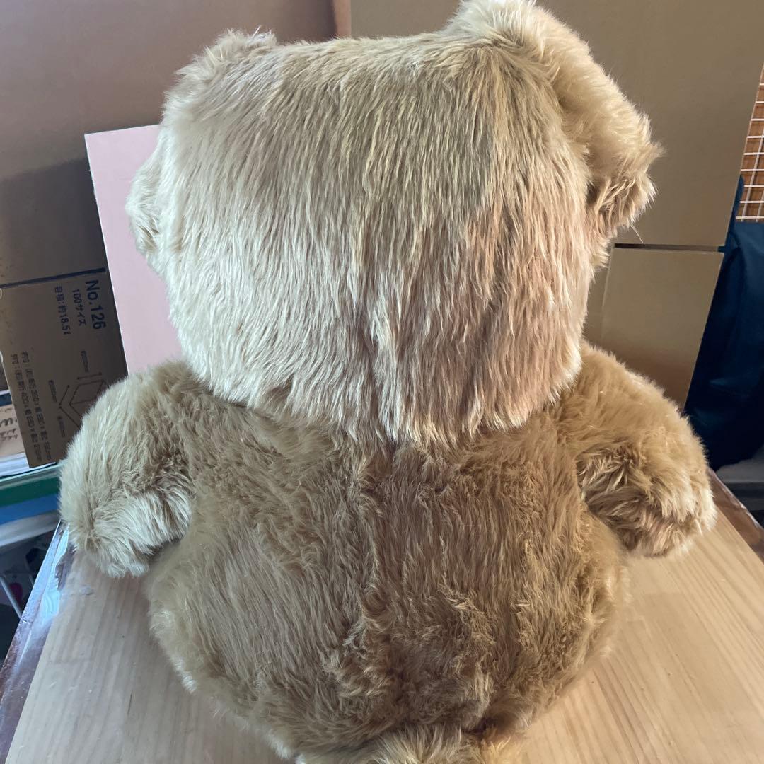 特大テディベアーお座りタイプ青色リボン付きぬいぐるみ