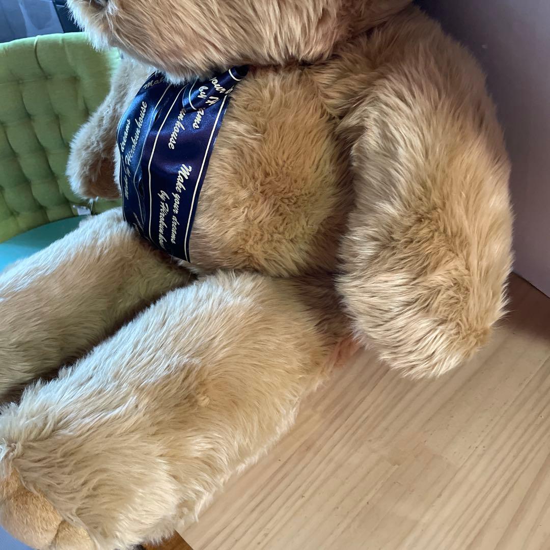 特大テディベアーお座りタイプ青色リボン付きぬいぐるみ