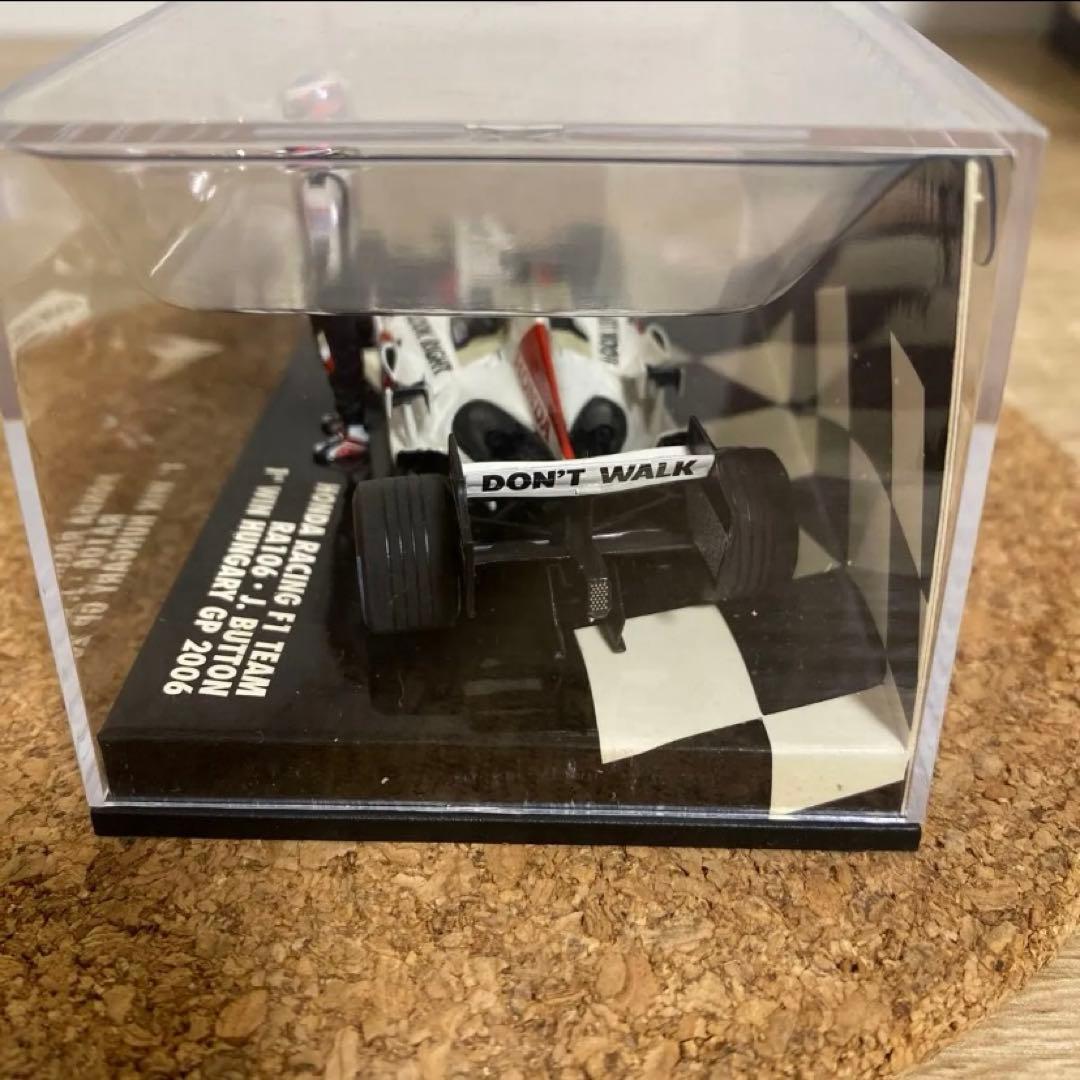 ミニチャンプスHONDARACING RA106.J.BUTTON 1 WIN