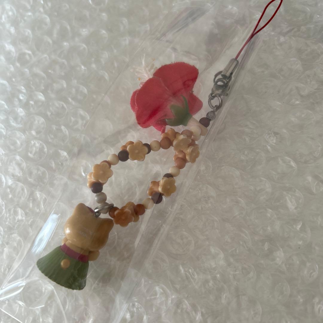 キティ　日焼け　ストラップ　ハワイ