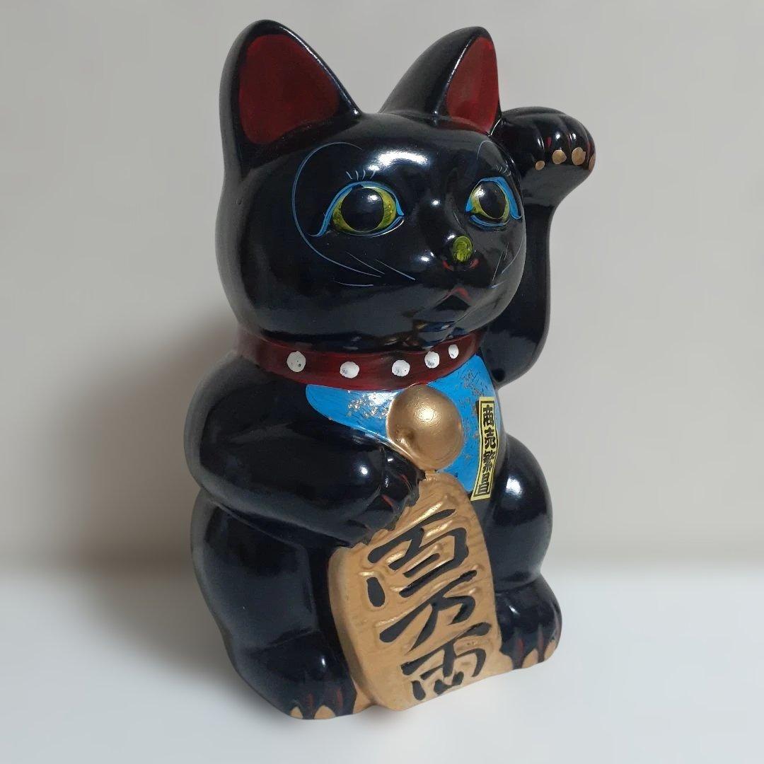 129　瀬戸焼　 黒色　8寸　招き猫　左手上げ　 陶器製　約25㎝　商売繁盛