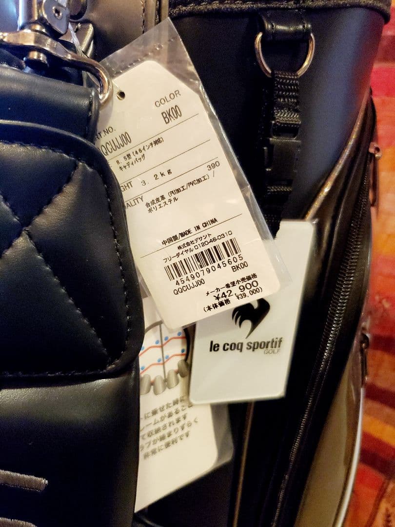 ラ*ィ様 未使用品　LE COQ SPORTIF ゴルフバッグ 黒・メタリック
