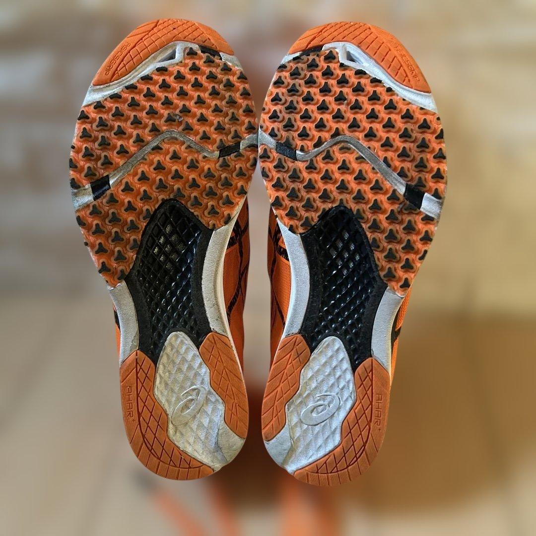 ASICS SORT THE MAGIC 6 オレンジスパイクシューズ