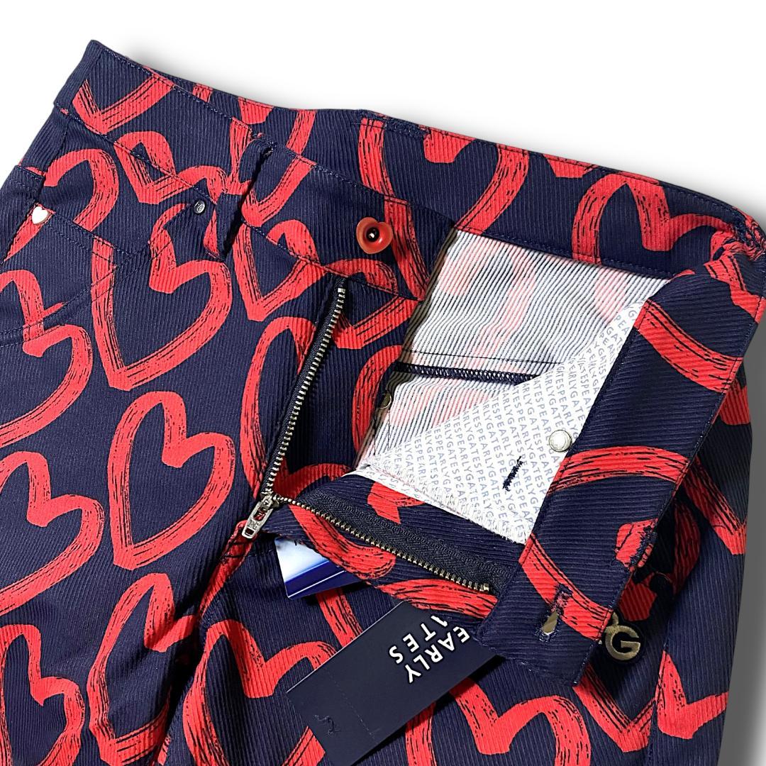 定31900円 1 パーリーゲイツ 落書きハート柄 ストレッチ ロングパンツ 紺