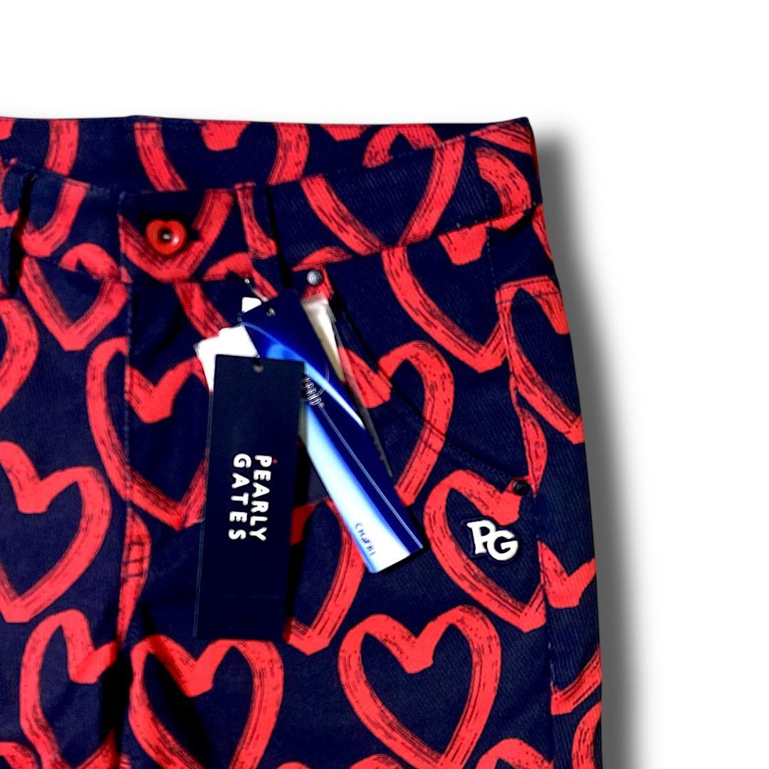 定31900円 1 パーリーゲイツ 落書きハート柄 ストレッチ ロングパンツ 紺