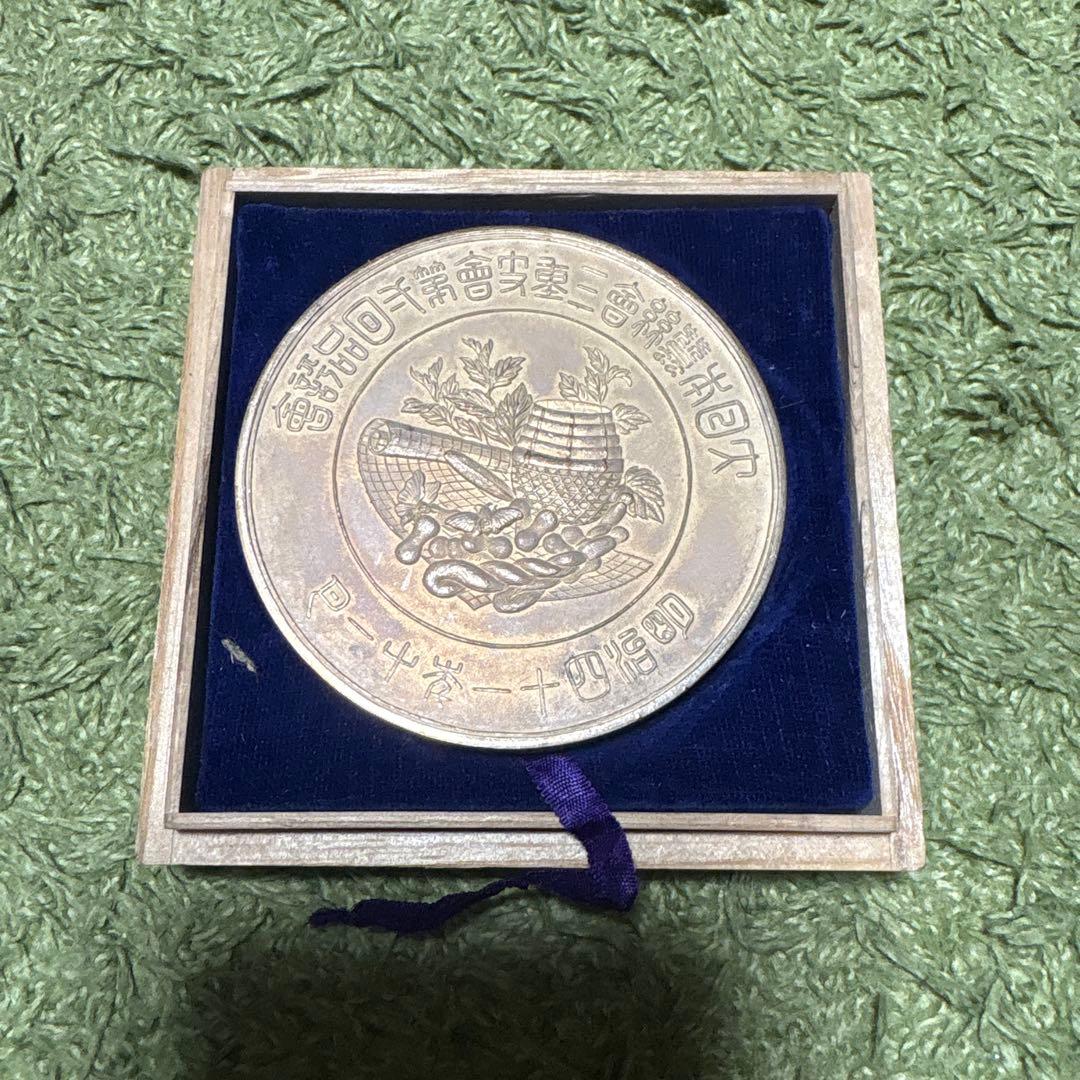 コレクションなどに銀の記念メダル