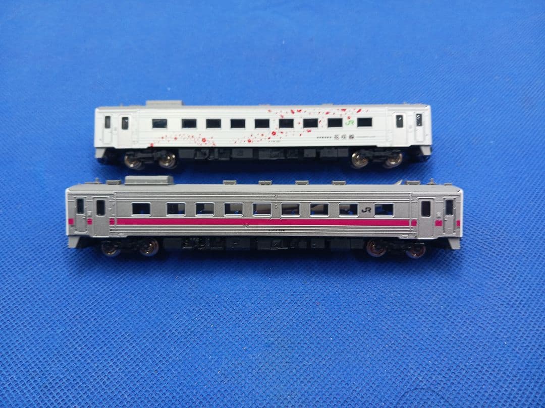 GM 50712 30408 地球探索鉄道花咲線ラッピングトレイン ピンク帯2両