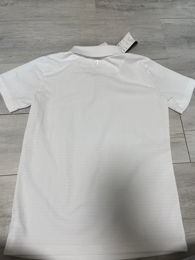 新品　Mサイズ ゴルフウェア　レディース　白　ポロシャツ　スリクソン　シャツ